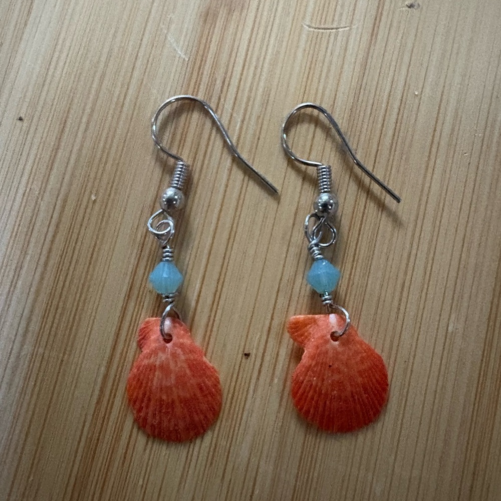 XS Lions Paw Orange Shell Dangle Earrings